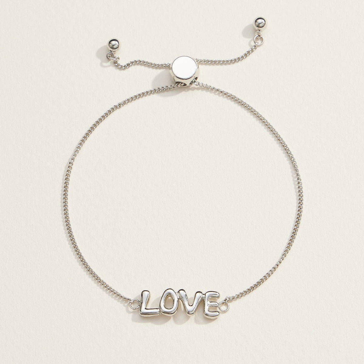 Spread love with our Love Script Adjustable Bracelet, featuring a sleek "LOVE" design in polished silver tones. This lightweight and chic bracelet has an adjustable chain with a sliding clasp, ensuring a perfect fit for any wrist size. Whether worn solo or layered, this bracelet is a versatile accessory for daily wear or special occasions. It's an ideal gift for anniversaries, Valentine's Day, or simply to show someone you care.
Details:
Love Script
Adjustable
18K Gold Dipped Bracelet in Silver