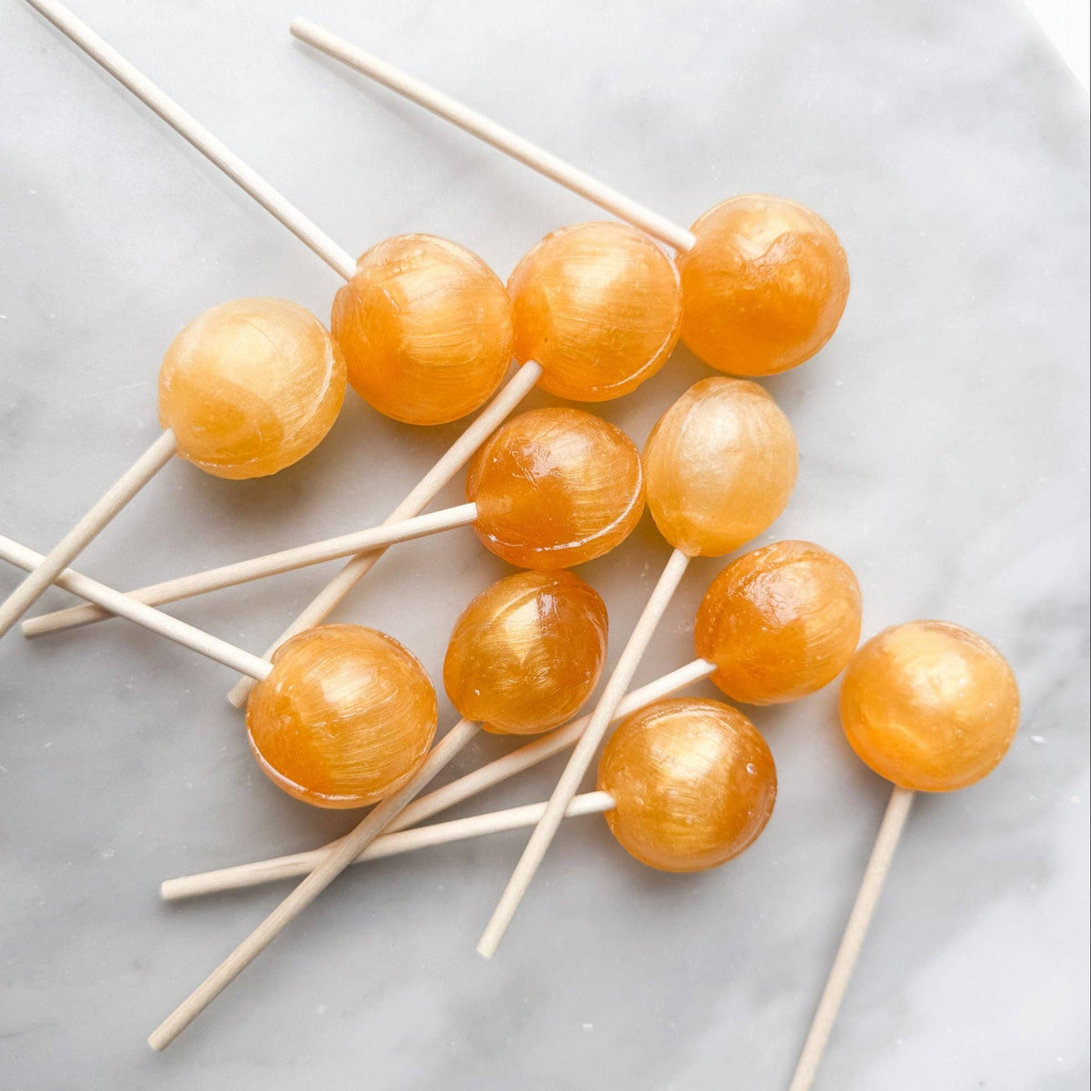Experience the whimsical taste of our Butterbeer lollipop, inspired by the beloved classic wizardly beverage. This lollipop features a rich blend of creamy butterscotch complemented by a subtle hint of apple, creating a unique and indulgent flavor profile.
Details:
Made in the USA, our candy is all American candy.
Ingredients: sugar, glucose, water less than 2% of citric acid, food coloring, artificial/natural flavoring, vegetable glycerin.