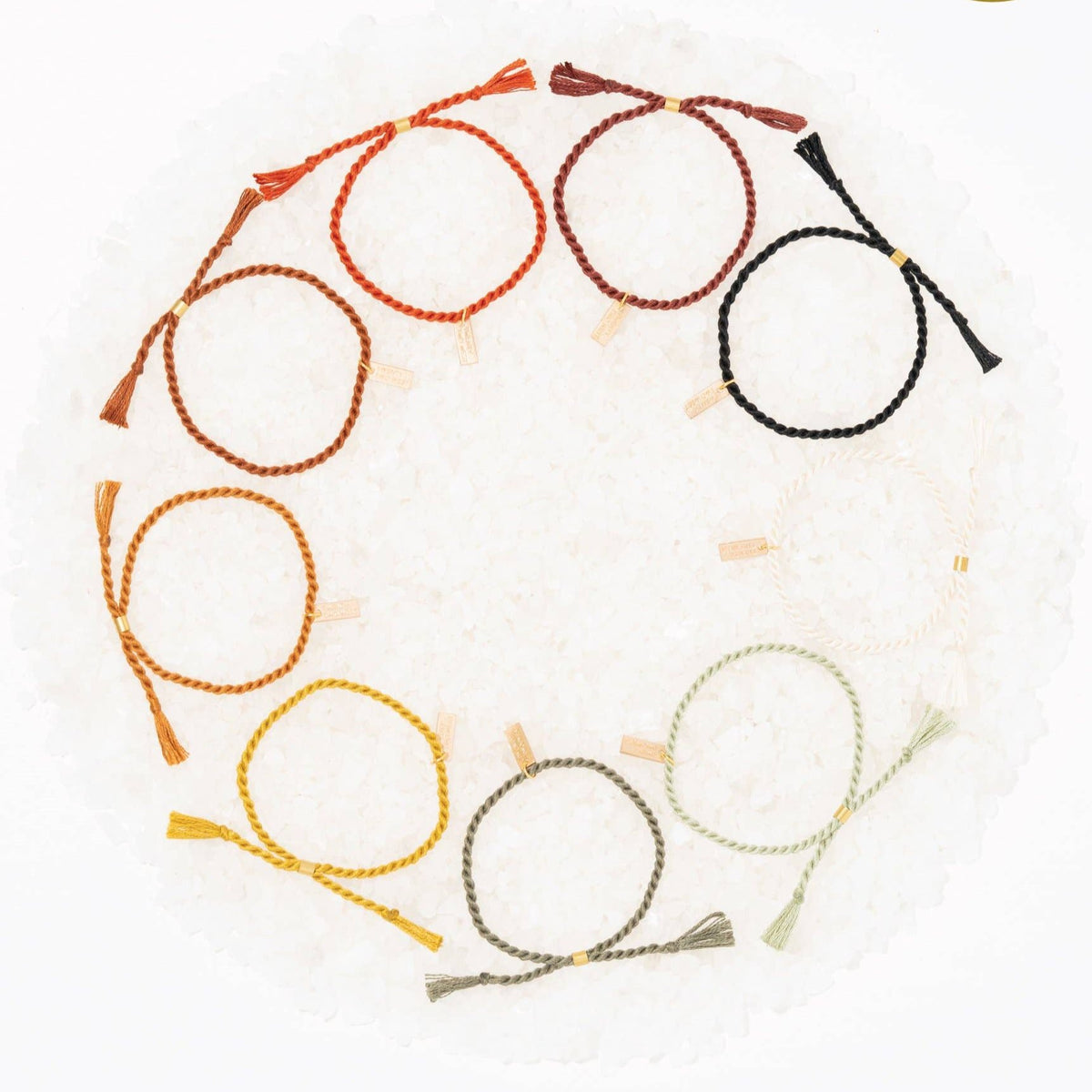 A delicate twist on Twenty Two West's crowd-favorite rope bracelets. The rope is hand spun from a single hue of cotton threads to create this soft and comfortable adjustable bracelet. Wear them individually or collect them all to mix-and-match in a complementary stack! Eucalyptus color.