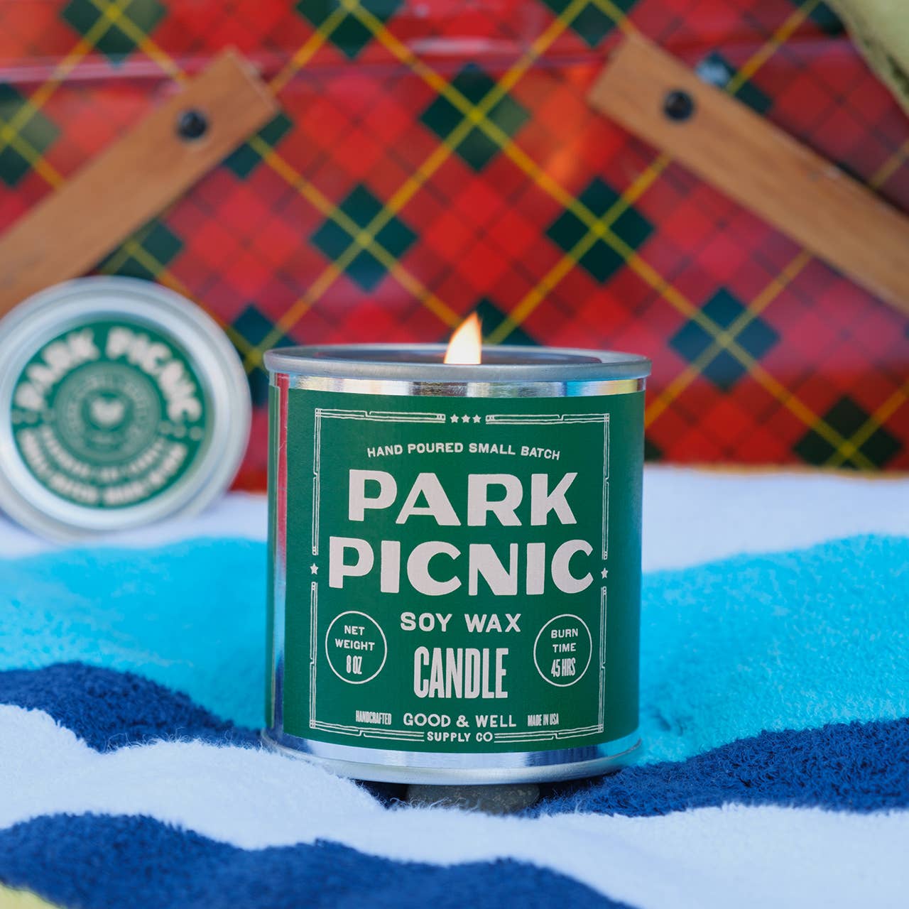 Candle labeled 'Park Picnic' with a tartan background