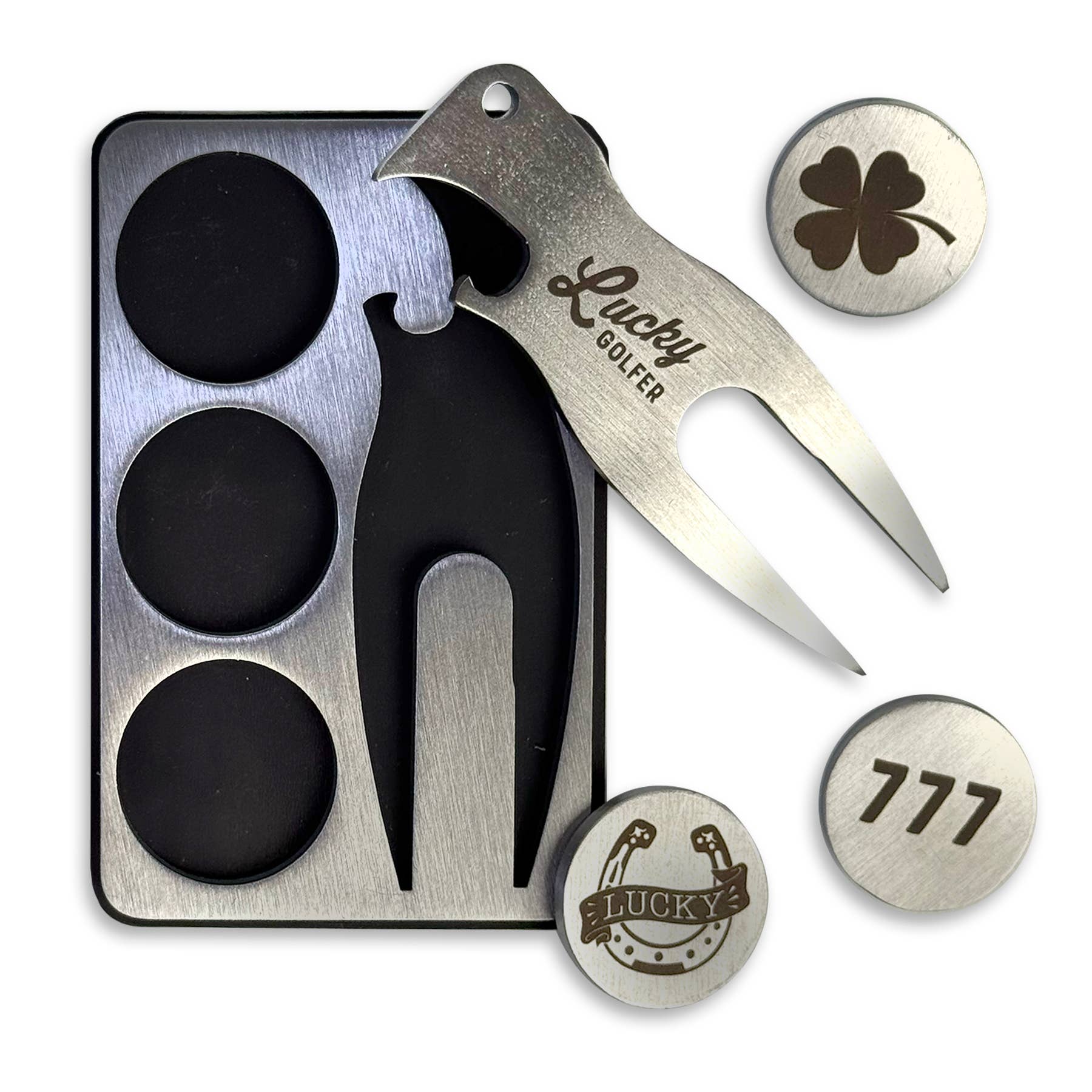 Golf accessories including a divot tool, ball markers, and a marker tray on a white background.