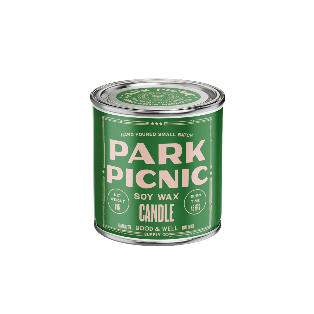 Green candle container labeled 'Park Picnic' on a white background