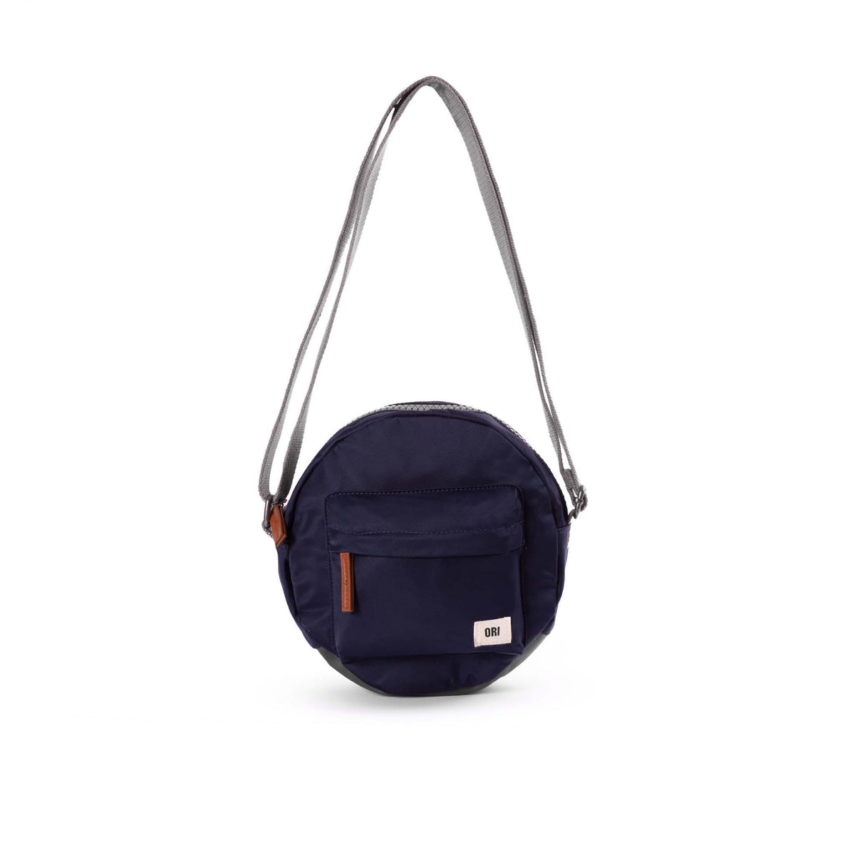 Over the shoulder and crosstown, our Paddington Crossbody is the perfect round bag to sling across your body and take on your day. Midnight COLOR
The Paddington bag has three pockets and sections to keep everything organized, safe and secure, all in weather-resistant, recycled material.
The size is the perfect accessory to store all your daily necessities - mobile, wallet, keys, and more! Our Paddington Crossbody is the only, stylish round bag out there.