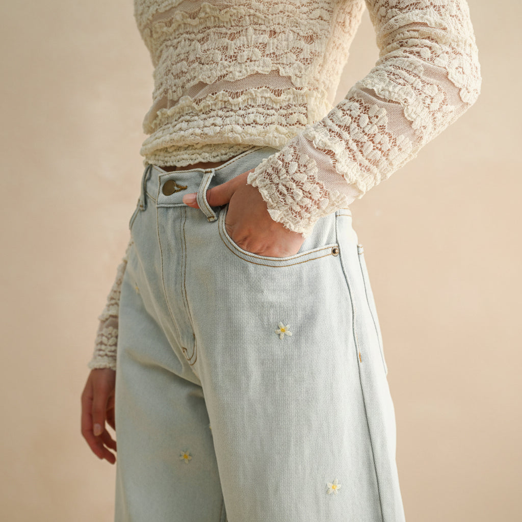 Celebrate your unique style with these Flower Embroidery Pants in classic denim. Delicate floral details add a touch of artistry to an everyday essential, creating a look that's both comfortable and expressive. Perfect for those who want to bring a little beauty into their wardrobe.