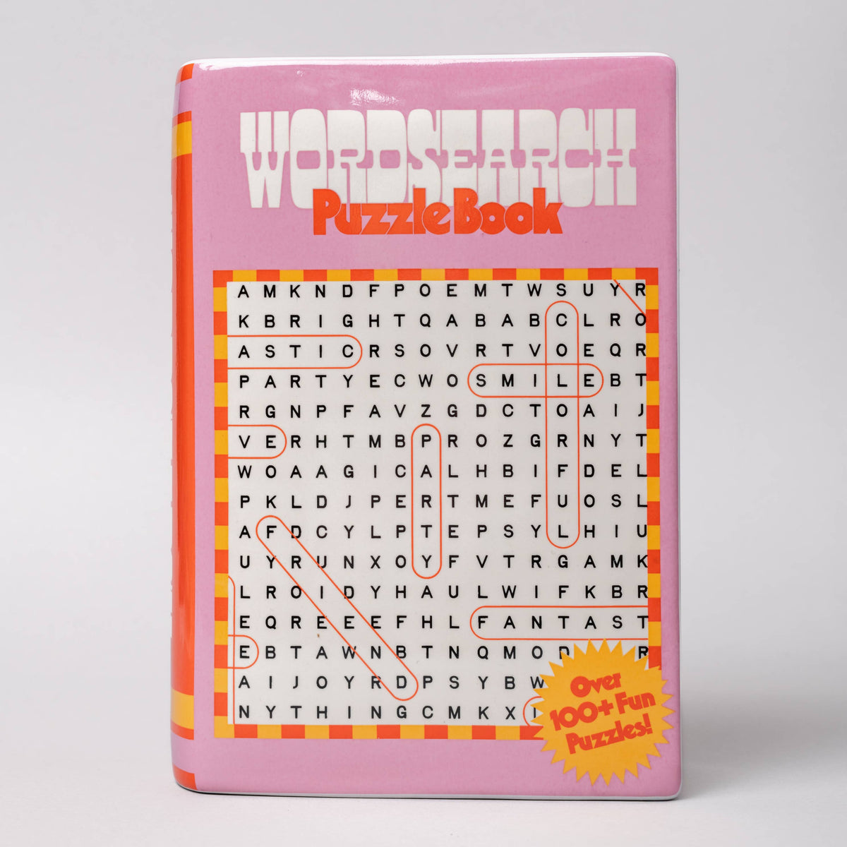 Pink puzzle VASE with word search design on a light gray background