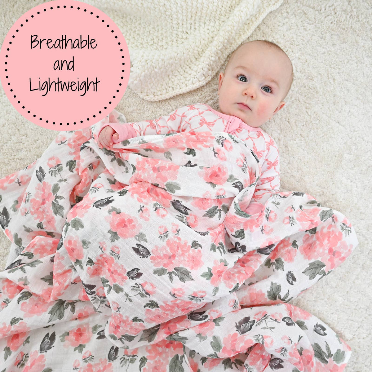 Baby wrapped in a floral blanket with text 'Breathable and Lightweight' on a light background