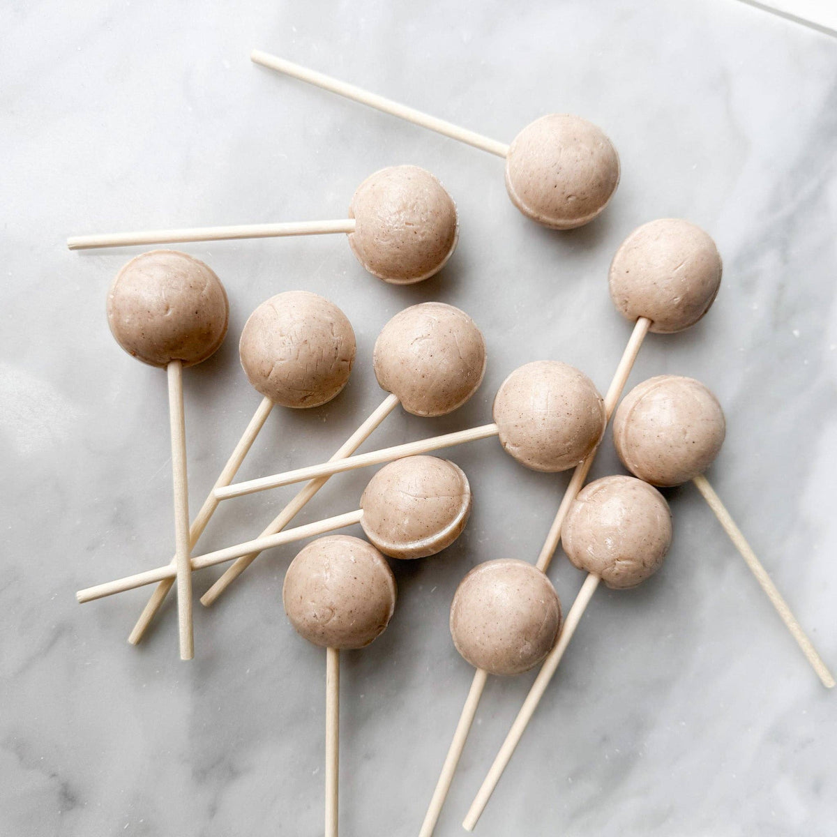 Our Chai lollipop is a delightful confection that brings the comforting flavors of traditional chai tea to a convenient and enjoyable format. It features a harmonious combination of warm spices such as cinnamon, cardamom, and ginger, complemented by a smooth sweetness.
Details:
Made in the USA, our candy is all American candy.
Ingredients: sugar, glucose, water less than 2% of citric acid, food coloring, artificial/natural flavoring, vegetable glycerin, ground cinnamon, ground cloves.