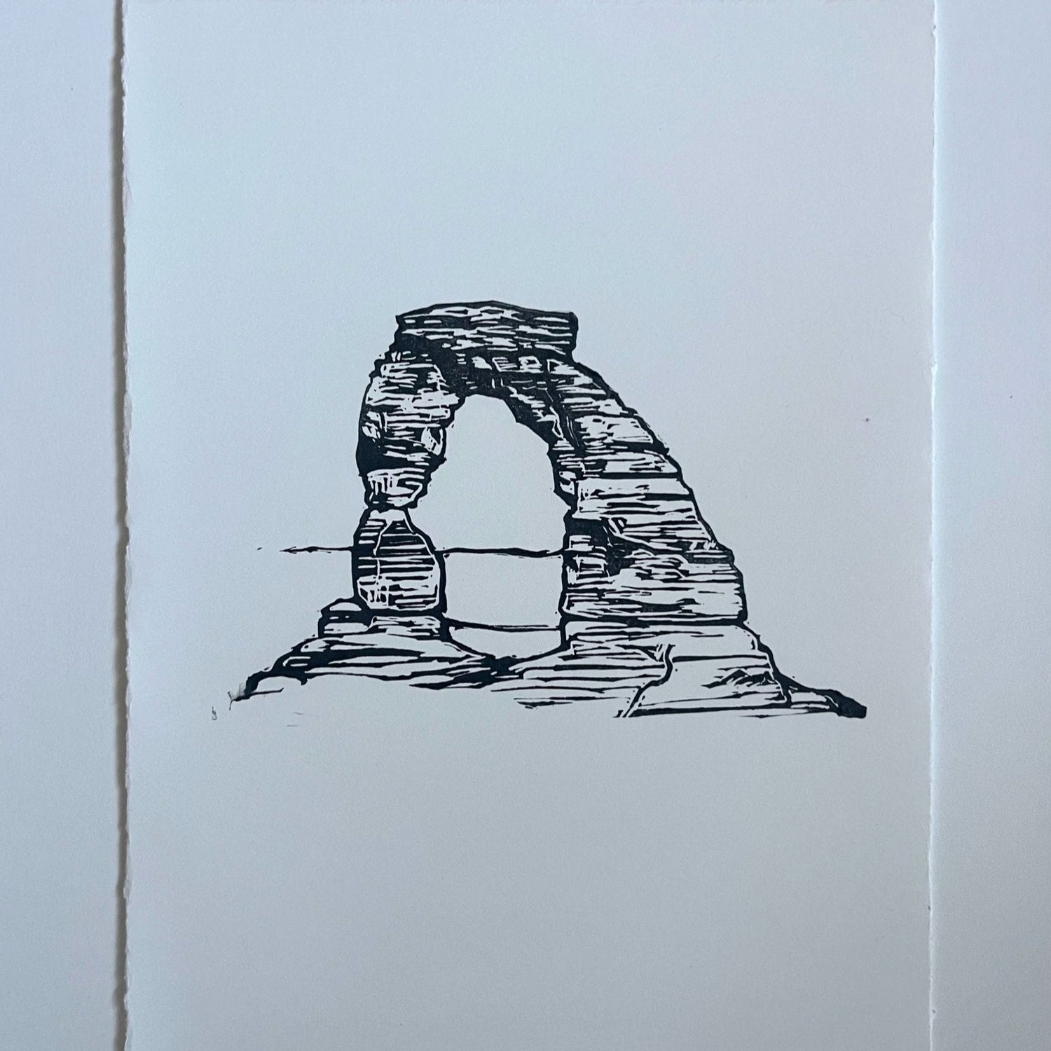 hand carved and pressed black and white 8x10 print of delicate arch