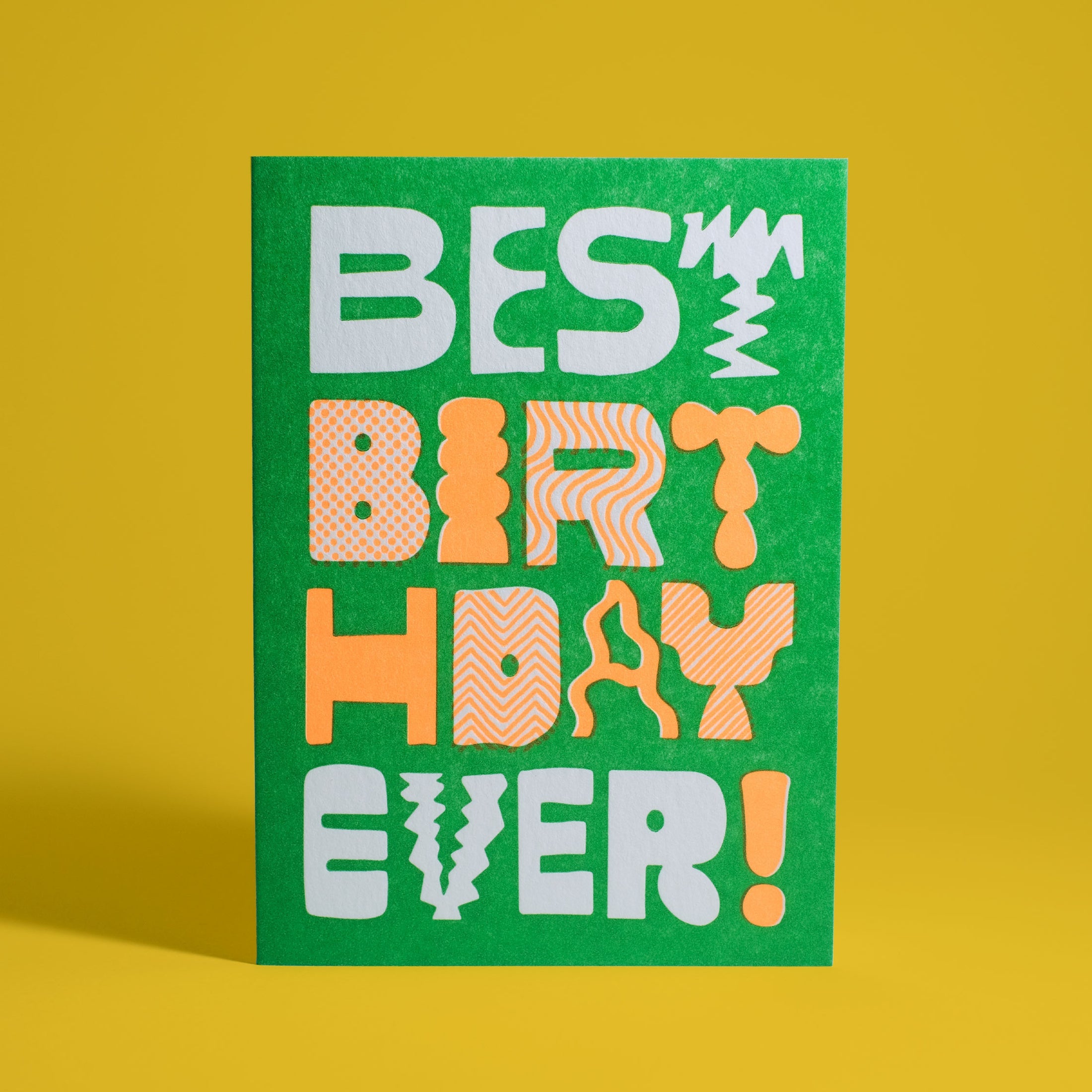 Bright green card with funky lettering in white and orange. Says Best Birthday Ever!