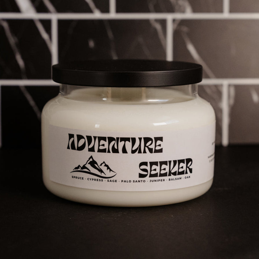 Adventure seeker Double wick 12 oz soy wax candle in an apothecary glass vessel