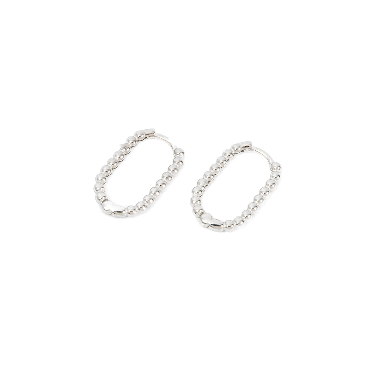 Silver oval huggies with bubbled details going all the way around