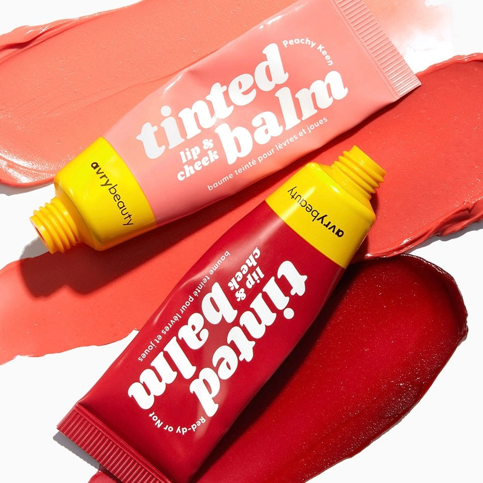 Two is better than one with our Cheery Duo! This set includes two vibrant Lip & Cheek Tinted Balms —Peachy Keen and Red-dy or Not. These multi-use balms melt into skin for a wash of blendable, buildable, beautiful color that suits every skin tone. The peachy pink hue is subtle and sweet and transitions easily from day to night while the bold red shade is fierce, fun, and ready to command attention. These balms are the best of both worlds: makeup and vegan skincare in one.