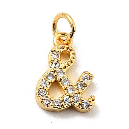 Add a touch of sparkle and style to your jewelry with our Sparkling "&" Sign Charm. This beautiful charm can be easily added to a bracelet or necklace, making it a versatile piece for any outfit. Let it symbolize your connection with someone special or simply add a unique touch to your everyday look.