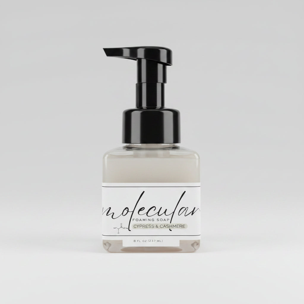 square clear bottle with black soap pump and white minimalistic label.
