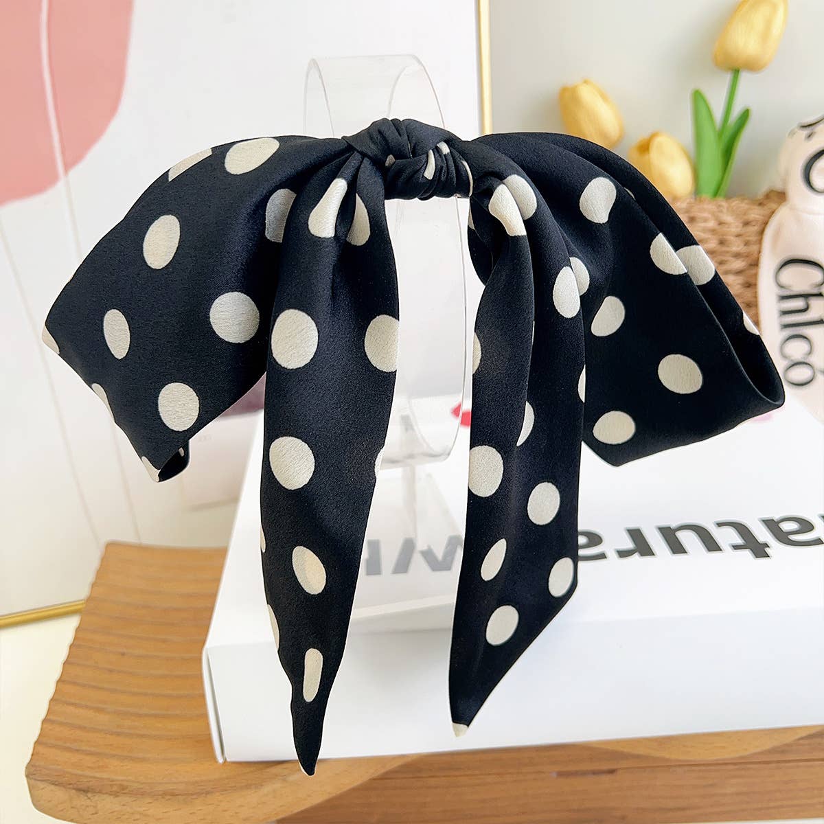 Make a statement with this charming French barrette featuring a classic black and white polka dot pattern. The elegant satin bow with flowing tails adds a touch of sophistication to any hairstyle, while the large clip size provides a secure hold for thick or voluminous hair. Perfect for creating polished updos, half-up styles, or simply adding a vintage-inspired accent to your everyday look. This timeless piece brings effortless elegance and playful style together.
Details:
6cm x 34cm