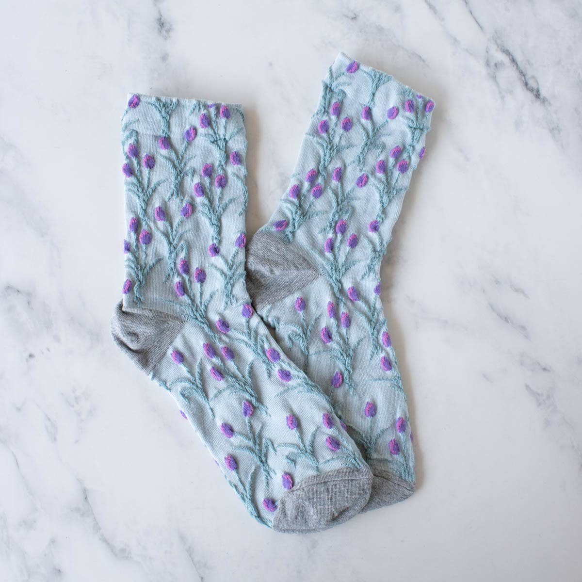 Get a vintage vibe with our Vintage Tulip Casual Socks. Made with care, these socks add a classic touch to any outfit. Enjoy the comfort and style of our unique design, perfect for any casual occasion.
Adult Size
80% Cotton ,10% Spandex, 10% Polyester