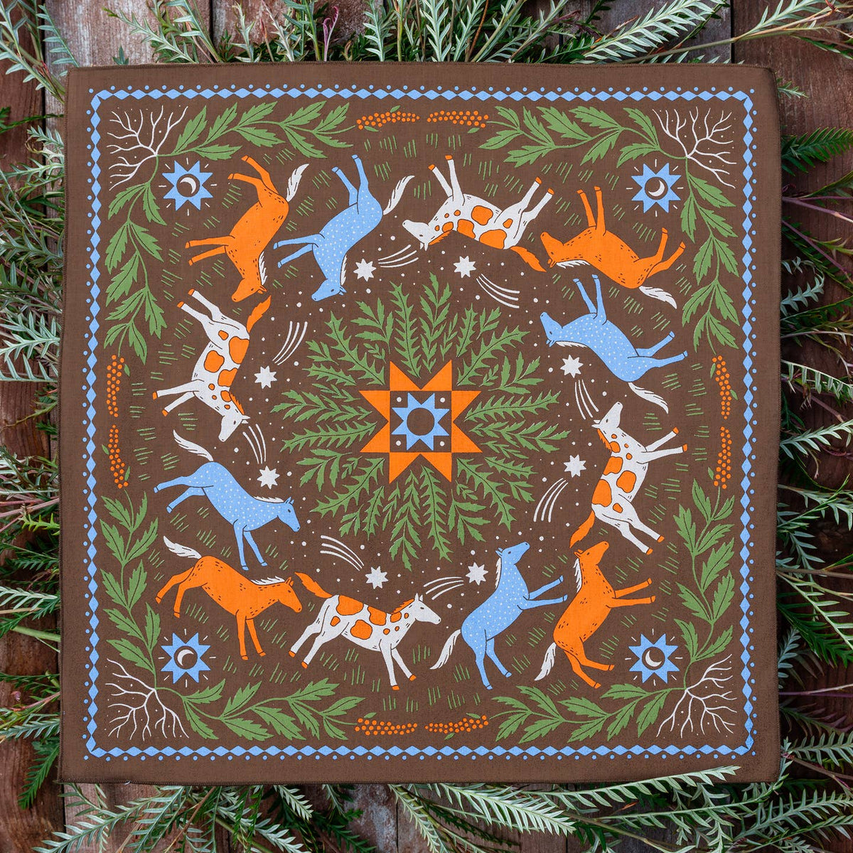Unleash your quirky and nature side with "New Moon", the organic cotton bandana that's good for both you and the environment. Made with 100% certified organic cotton, this versatile bandana is perfect for accessorizing while reducing your carbon footprint. Embrace this colorful take on the Wild West with “New Moon.”
Artist: Kelly Wills aka Brainflower Design
10% Goes To: Green Hill Humane Society