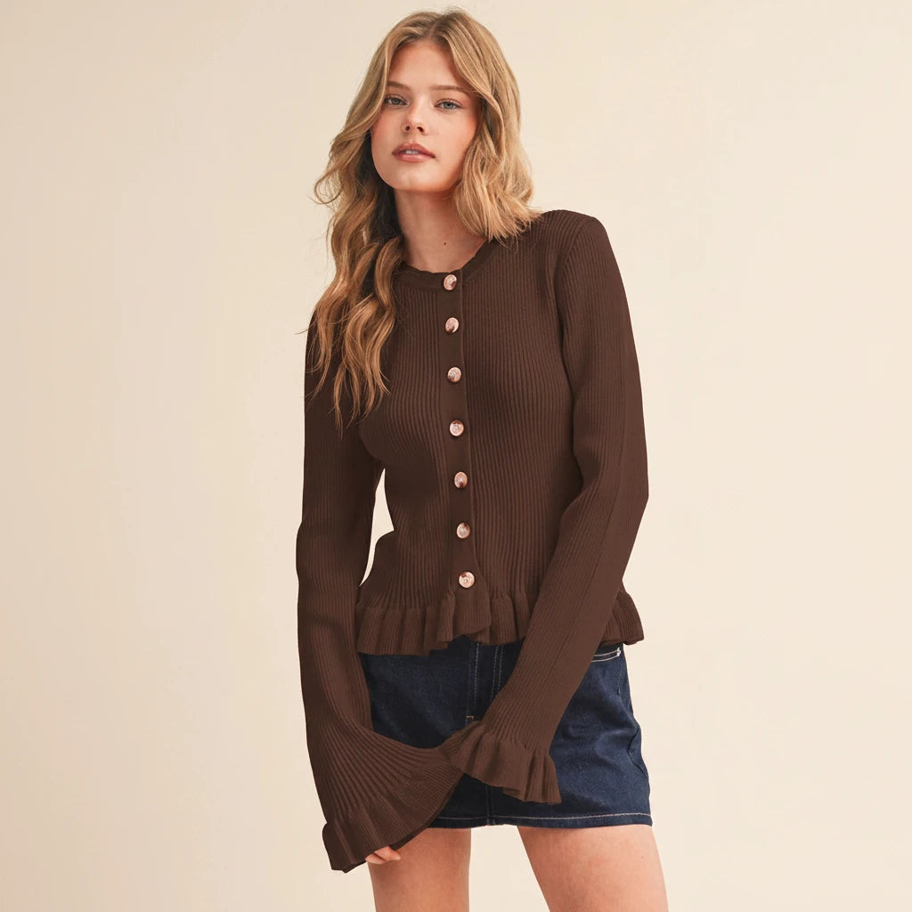 Wrap yourself in warmth and elegance with this solid brown long sleeve flutter sleeve top. The ribbed knit fitted bodice provides gentle support, while the scalloped round neckline and button-down placket add timeless charm. Flutter sleeves with ruffled cuffs create a soft, feminine silhouette that feels like the perfect closet addition to dress up or down.