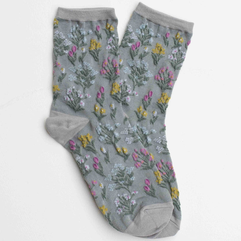 Step into nature’s charm with these embroidered floral crew socks. Designed with delicate wildflower patterns, they add a whimsical touch to your everyday outfits while offering comfort and durability.
Perfect for pairing with sneakers, loafers, or boots, these floral socks bring a fresh and playful accent to any look.