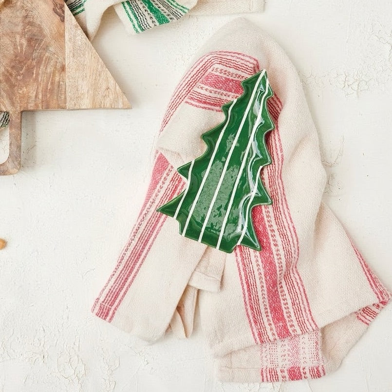 Bring festive warmth and cheerful holiday charm to your table with this lovely set of hand-painted ceramic tree-shaped plates. Featuring playful stripe patterns and whimsical holiday designs, these charming plates are perfect for serving sweet treats, appetizers, or festive holiday bites to family and guests alike.