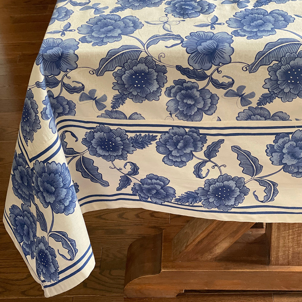 Welcome to the ultimate dining experience – the Megan Tablecloth! This beautiful cloth will protect and enhance any dinner table, providing a touch of elegance and class to your mealtime. From its sleek finish to the bold patterns, this exclusive tablecloth will ensure your dinner parties are ones to remember! Bring some pizzazz to the table – Megan Tablecloth! 60"X90" Hand screen printed. 100% cotton. Cold water machine wash. Low heat tumble dry.