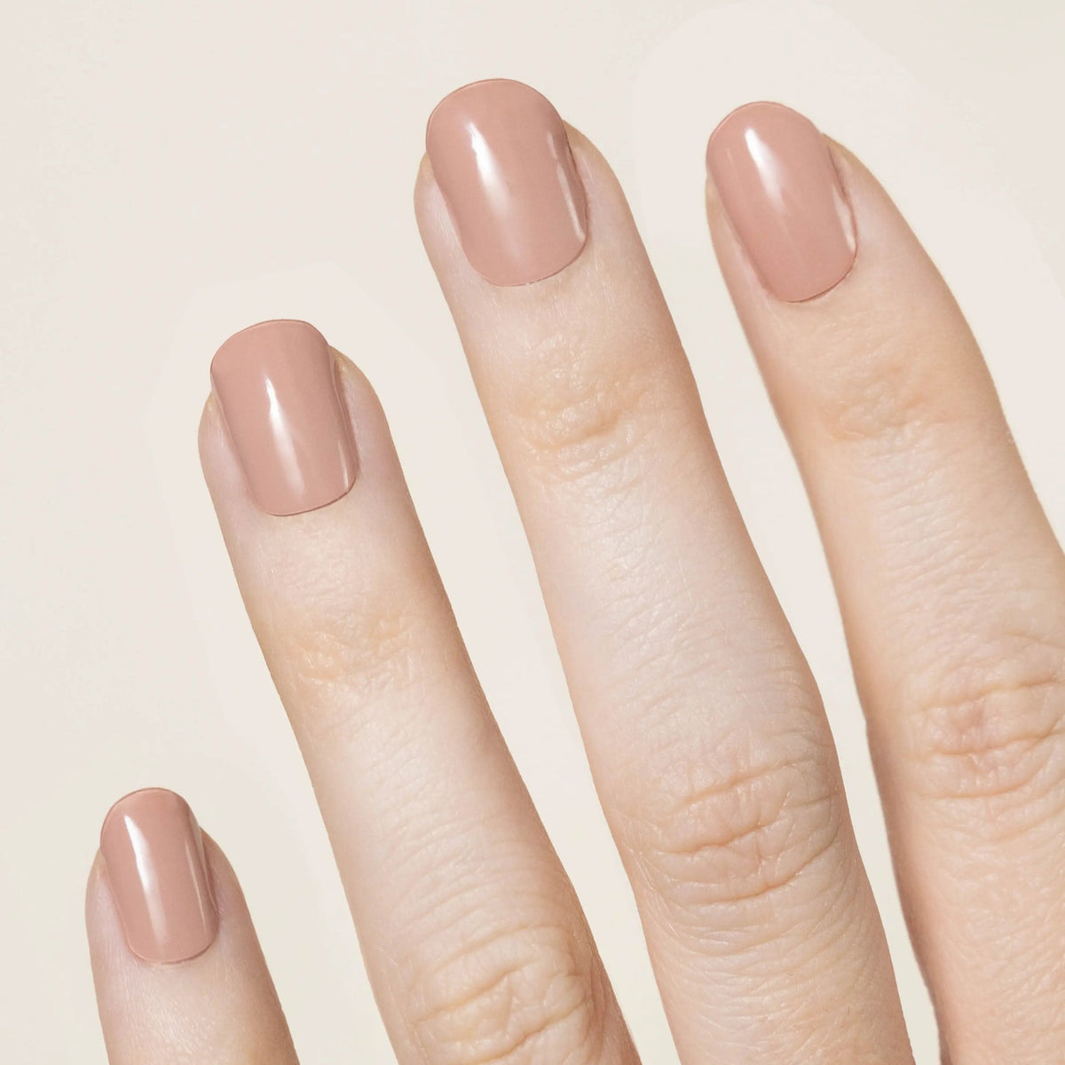 A rosy, toasted neutral nail that's flattering on any skin tone.