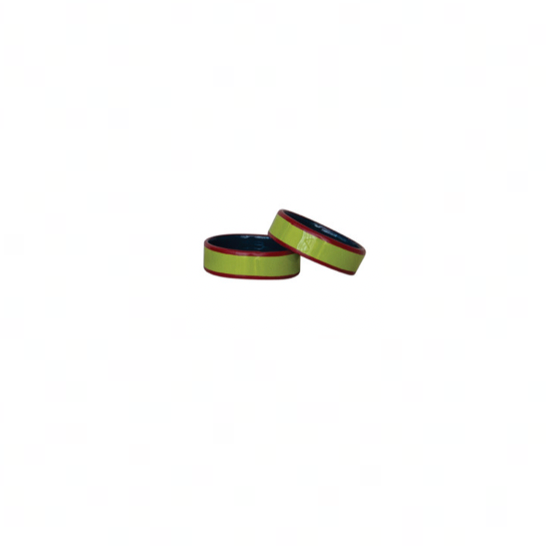 Lime green enameled napkin rings with dark red line on each side