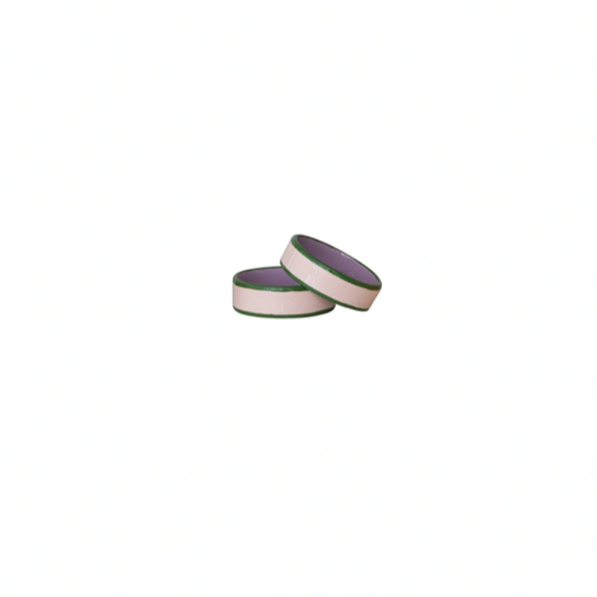 Cream enameled napkin rings with Army Green line on each side