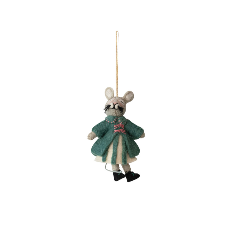 A small hanging mouse ornament dressed in a teal-green dress with cream trim, black shoes, and a red sash, suspended by a thin string against a plain white background.