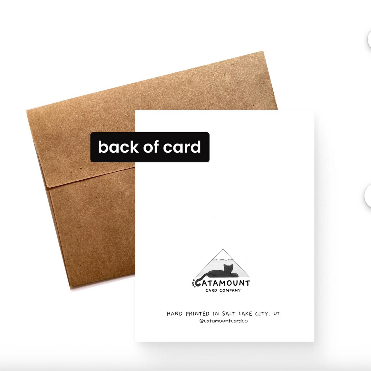 An image showing the back of the card with the Catamount Card Co logo of a cat laying in front of a snow-capped mountain, with, "Hand printed in Salt Lake City, UT" written below. A kraft brown paper envelope is included.