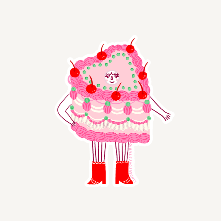 Pink heart cake with lots of frosting, a face, arms and legs.