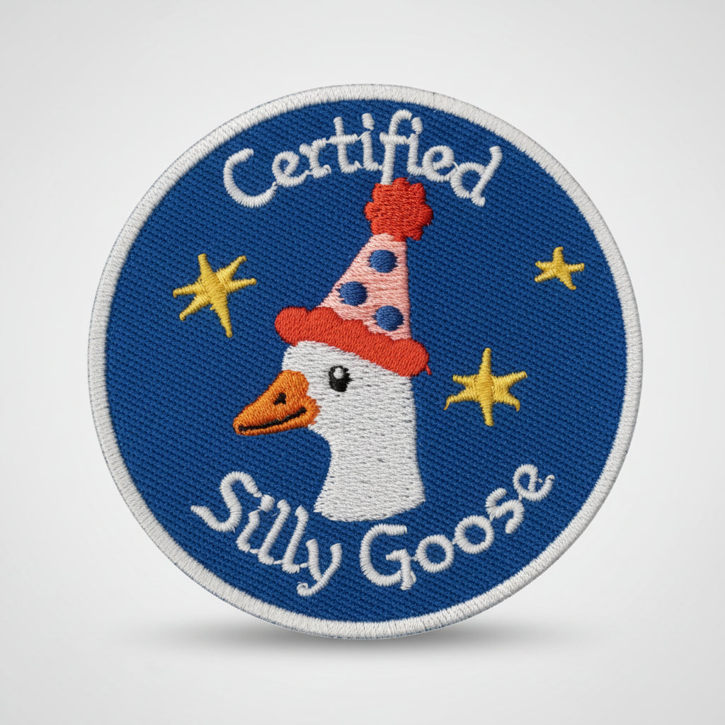 Iron-on round patch with a goose wearing a birthday hat and the words "Certified Silly Goose".