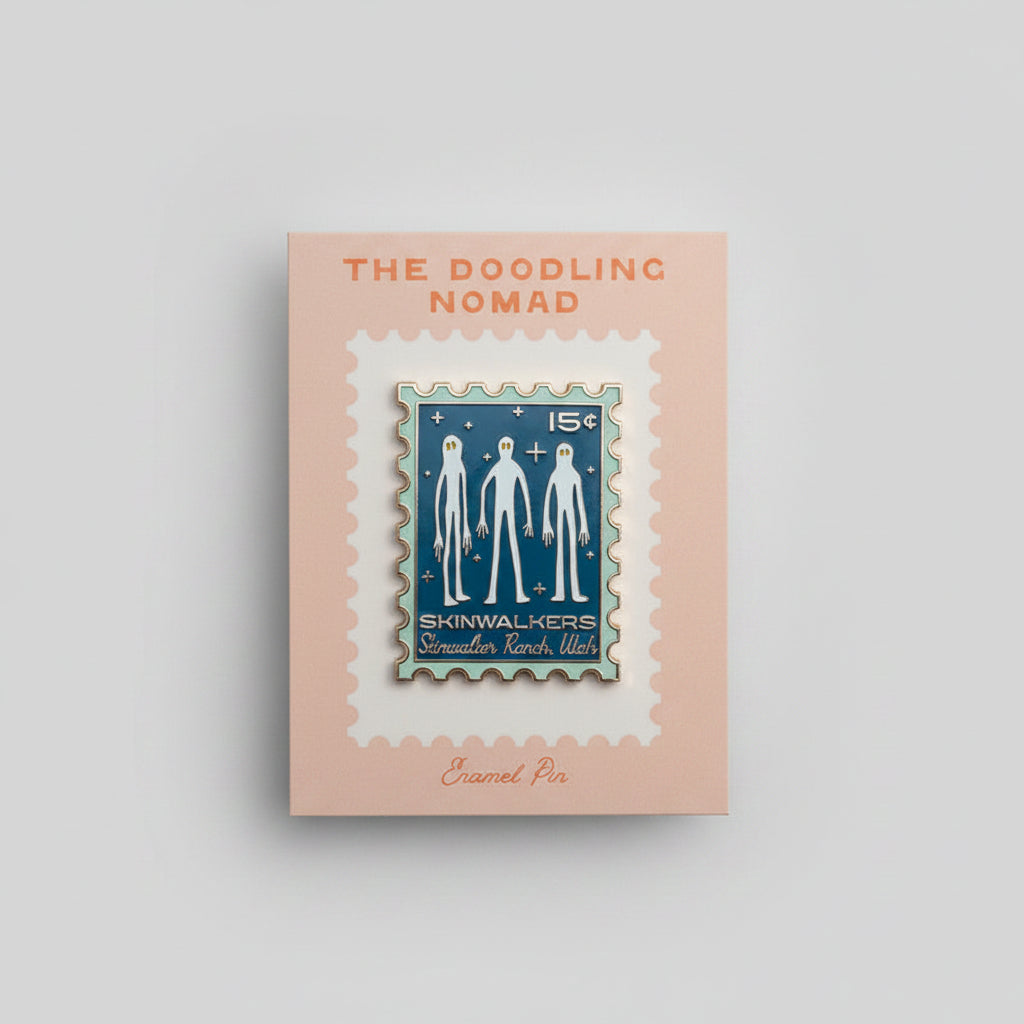 Enamel rectangular shaped pin with a blue background and three aliens in white, with the words "Skinwalkers Skinwalker Ranch, Utah."