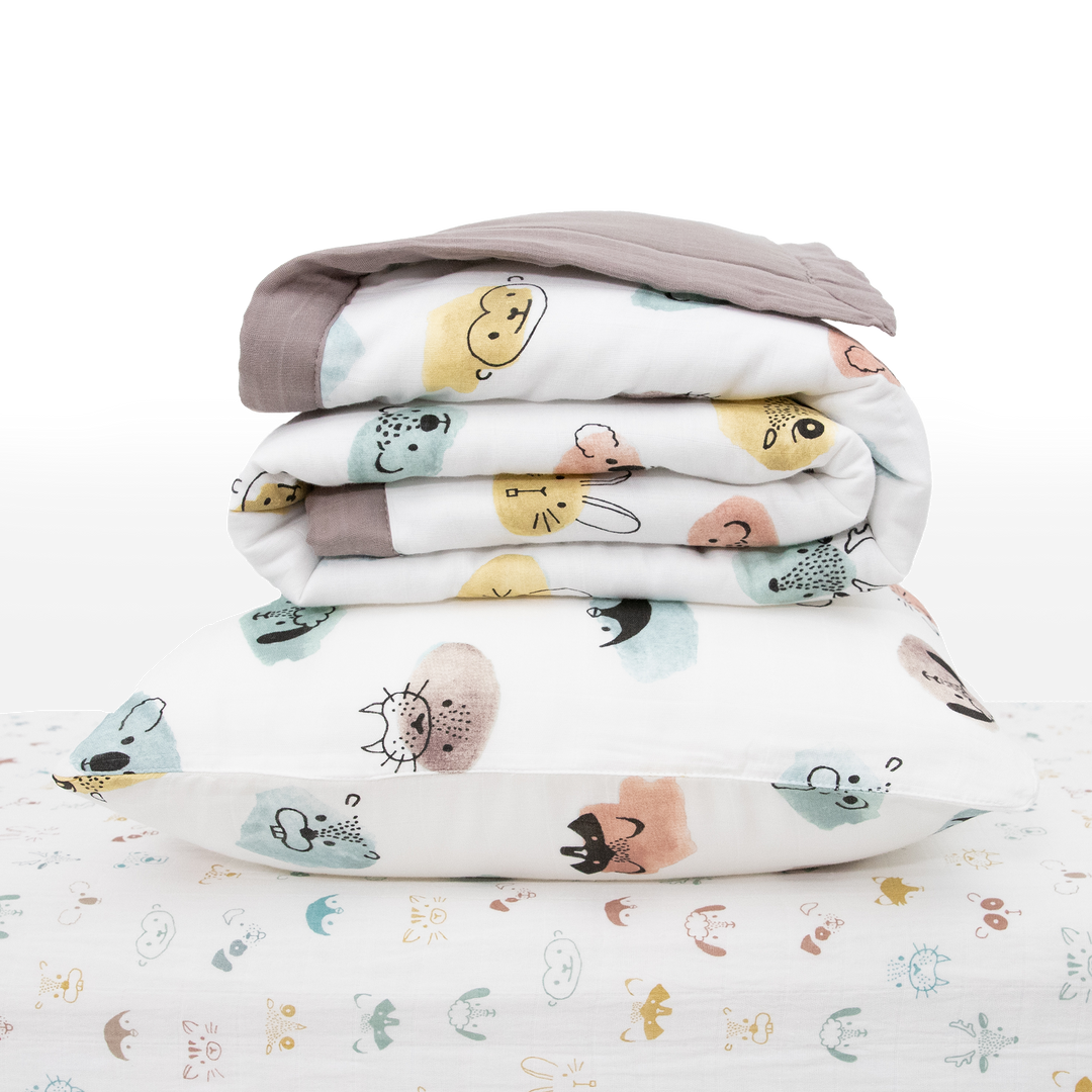 Celebrate their imagination. The Toddler Bedding Set features a variety of themes and prints to help bring their creativity to life as they transition from infant to toddler. 3 piece set includes: 1 Toddler Comforter, 1 crib sheet, 1 pillowcase. Cotton Muslin Toddler Bedding 3 Piece Set - Watercolor Critters