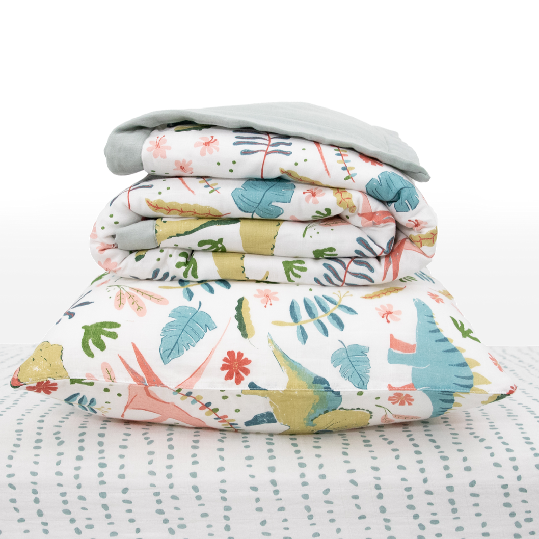 Celebrate their imagination. The Toddler Bedding Set features a variety of themes and prints to help bring their creativity to life as they transition from infant to toddler. 3 piece set includes: 1 Toddler Comforter, 1 crib sheet, 1 pillowcase. Cotton Muslin Toddler Bedding 3 Piece Set - Boho Dino