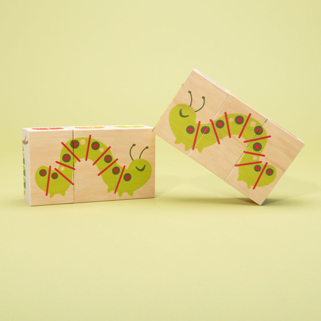 This floral frenzy is busting out with fun! Build your own garden scene. Six blocks feature tulips, colorful flowers, caterpillars, a butterfly, and more. Can you count the petals? How will you measure the inchworm with the ruler? More than colorful educational blocks, this artful set is a decorative puzzle, too. It’s blooming beautiful! 6 - 3 x 1.75 inch blocks