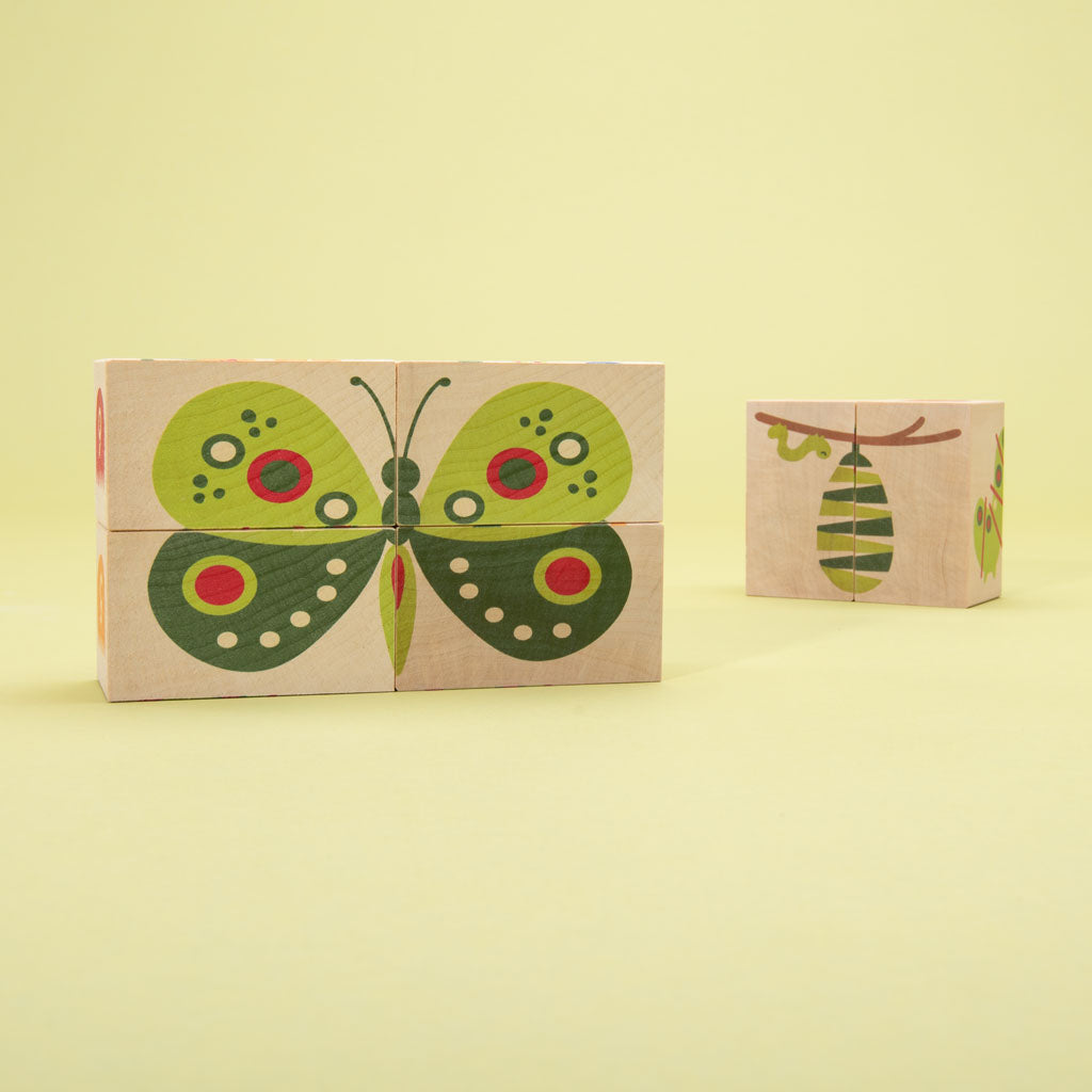 This floral frenzy is busting out with fun! Build your own garden scene. Six blocks feature tulips, colorful flowers, caterpillars, a butterfly, and more. Can you count the petals? How will you measure the inchworm with the ruler? More than colorful educational blocks, this artful set is a decorative puzzle, too. It’s blooming beautiful! 6 - 3 x 1.75 inch blocks