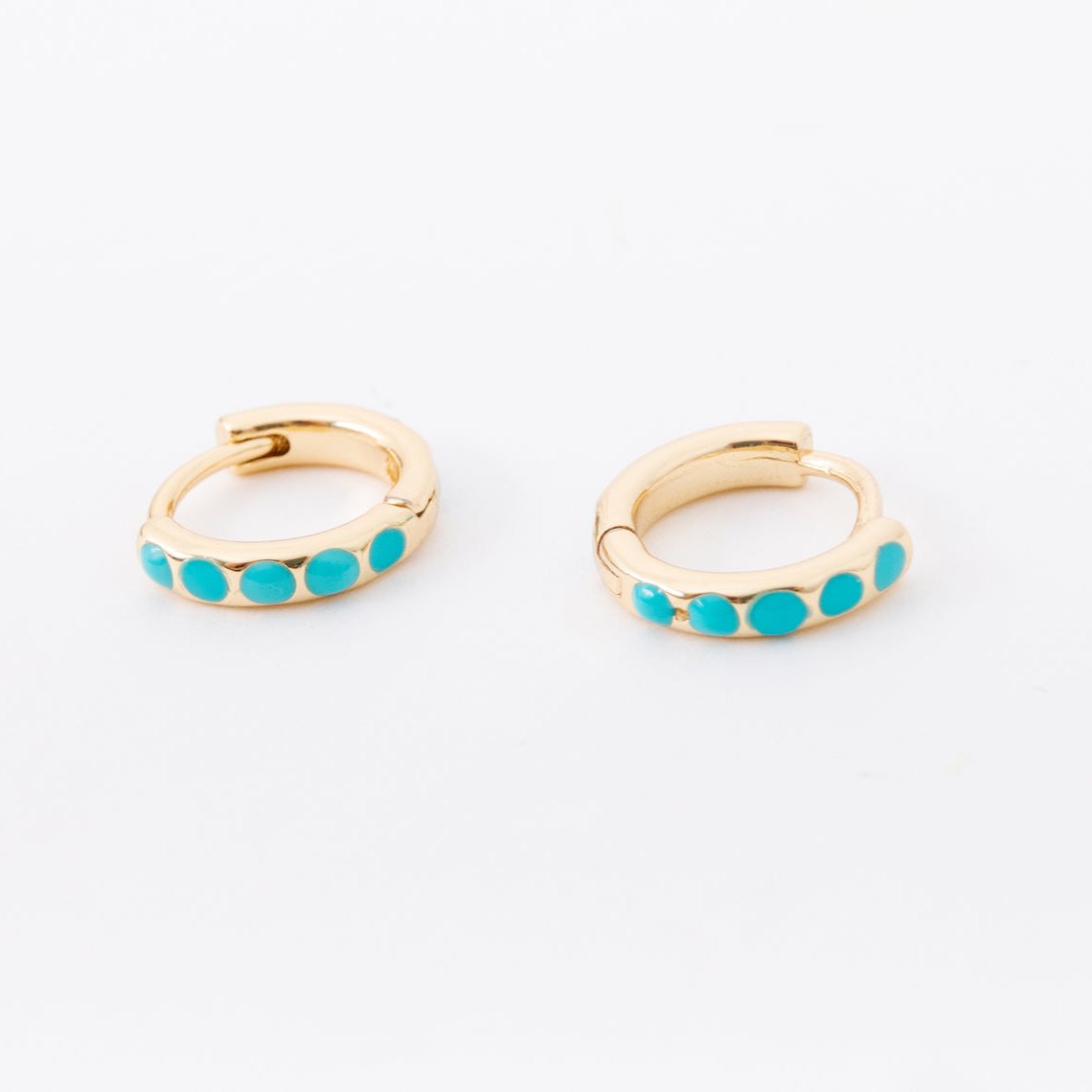 Turquoise goes with everything you own- its versatility is in a league all on its own! Paired with our reliable 14k gold filled metal, these earrings can be worn day in and day out without tarnishing, turning, or irritating your skin. You're going to need a pair of these for you... and every woman you know!