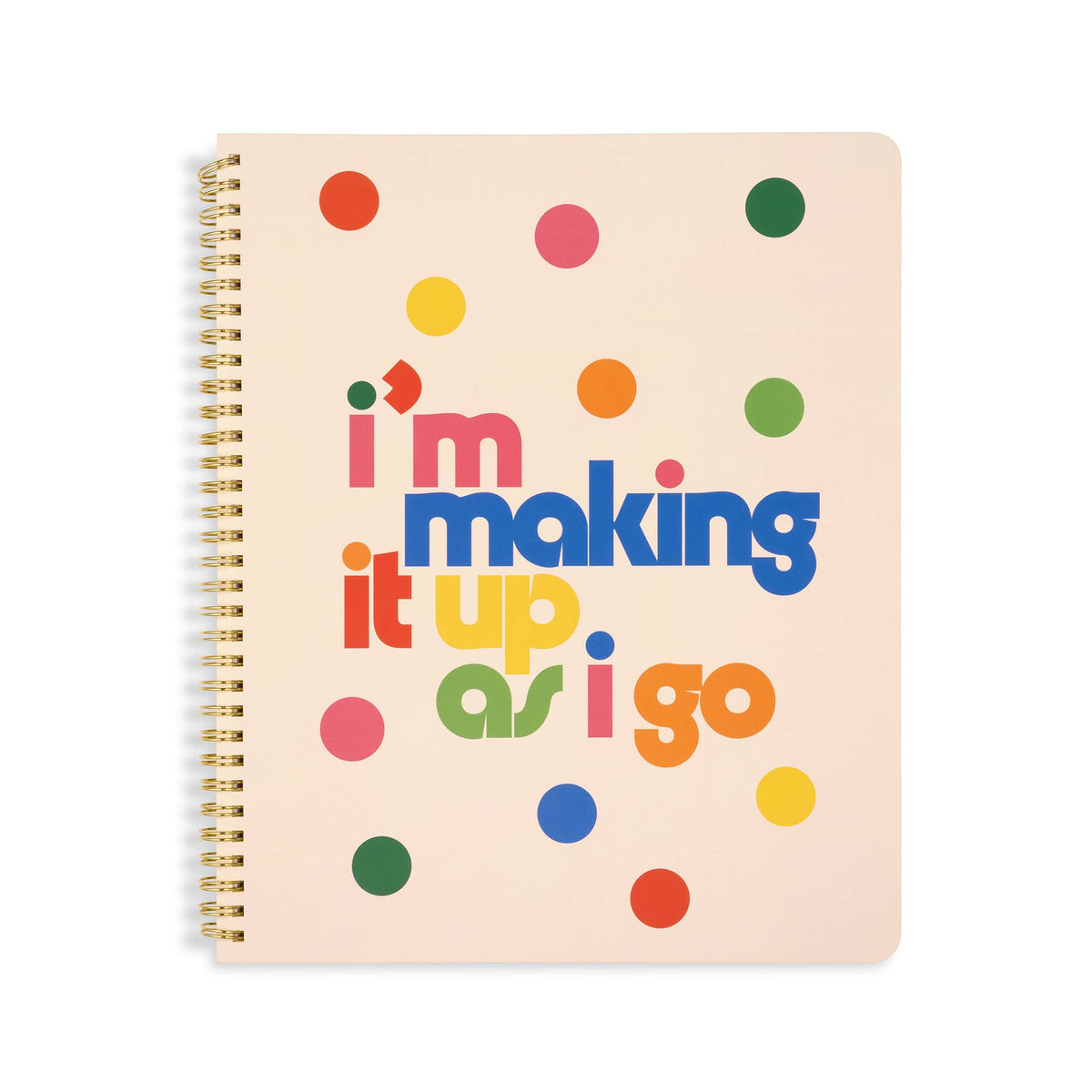 Notebook with colorful text and polka dots on a beige background with "I'm Making It Up As I Go"