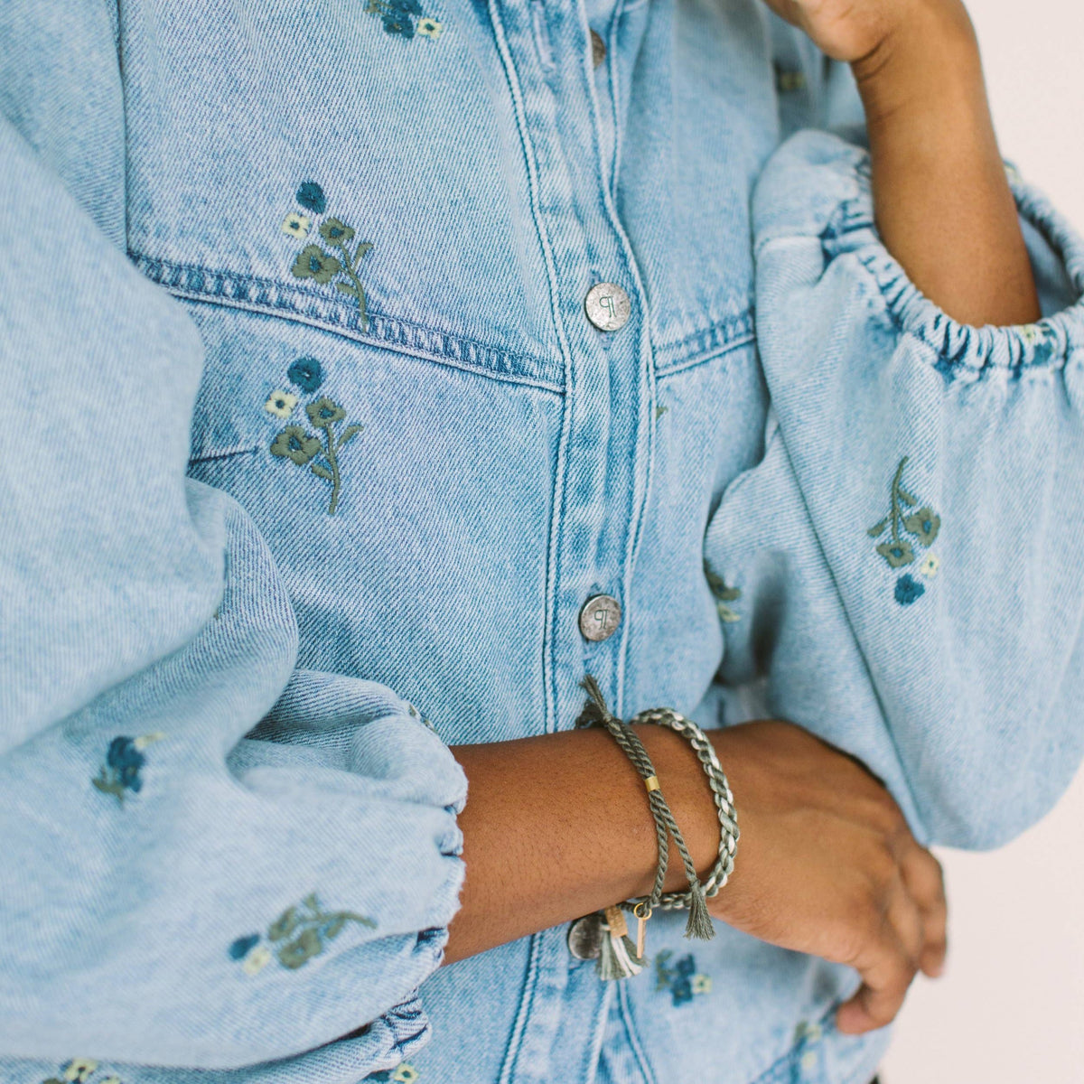 A delicate twist on Twenty Two West's crowd-favorite rope bracelets. The rope is hand spun from a single hue of cotton threads to create this soft and comfortable adjustable bracelet. Wear them individually or collect them all to mix-and-match in a complementary stack! Eucalyptus color.