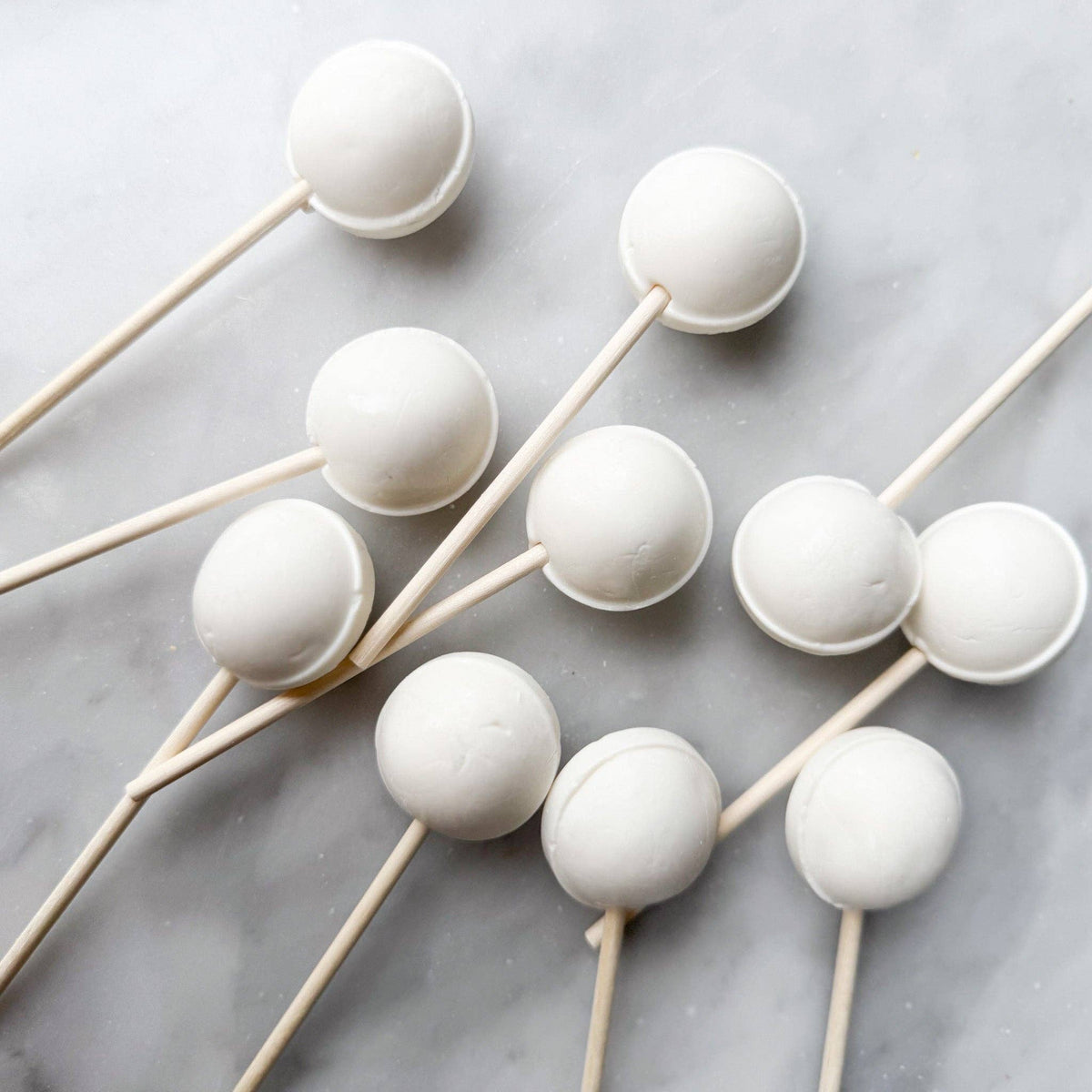 Our Marshmallow Fluff lollipop is a delightful candy that captures the beloved flavor of everyone's favorite squishy treat. This lollipop offers a rich, creamy taste that mimics the experience of indulging in fluffy marshmallows.
Details:
Made in the USA, our candy is all American candy—made in small batches by our talented candy makers
Ingredients: sugar, glucose, water less than 2% of citric acid, food coloring, artificial/natural flavoring, vegetable glycerin.