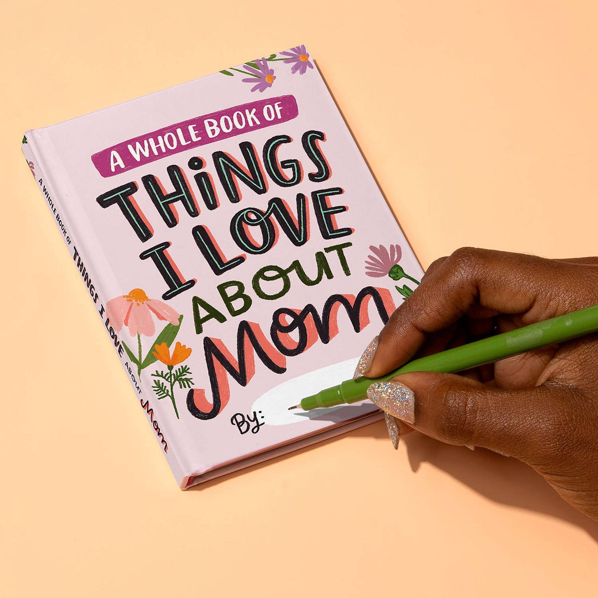 This little book is a secret weapon of love. Just fill in the blanks, and it transforms into the only book of its kind in the universe: a personalized, meaningful gift for your mom that will possibly make her cry—but in a really good way. How easy and perfect is that?
Details:
Fill-in-the-blank book measures 4.1" x 5.4"
Hardcover, 64 pages with 30 fill-in prompts
Acetate book jacket