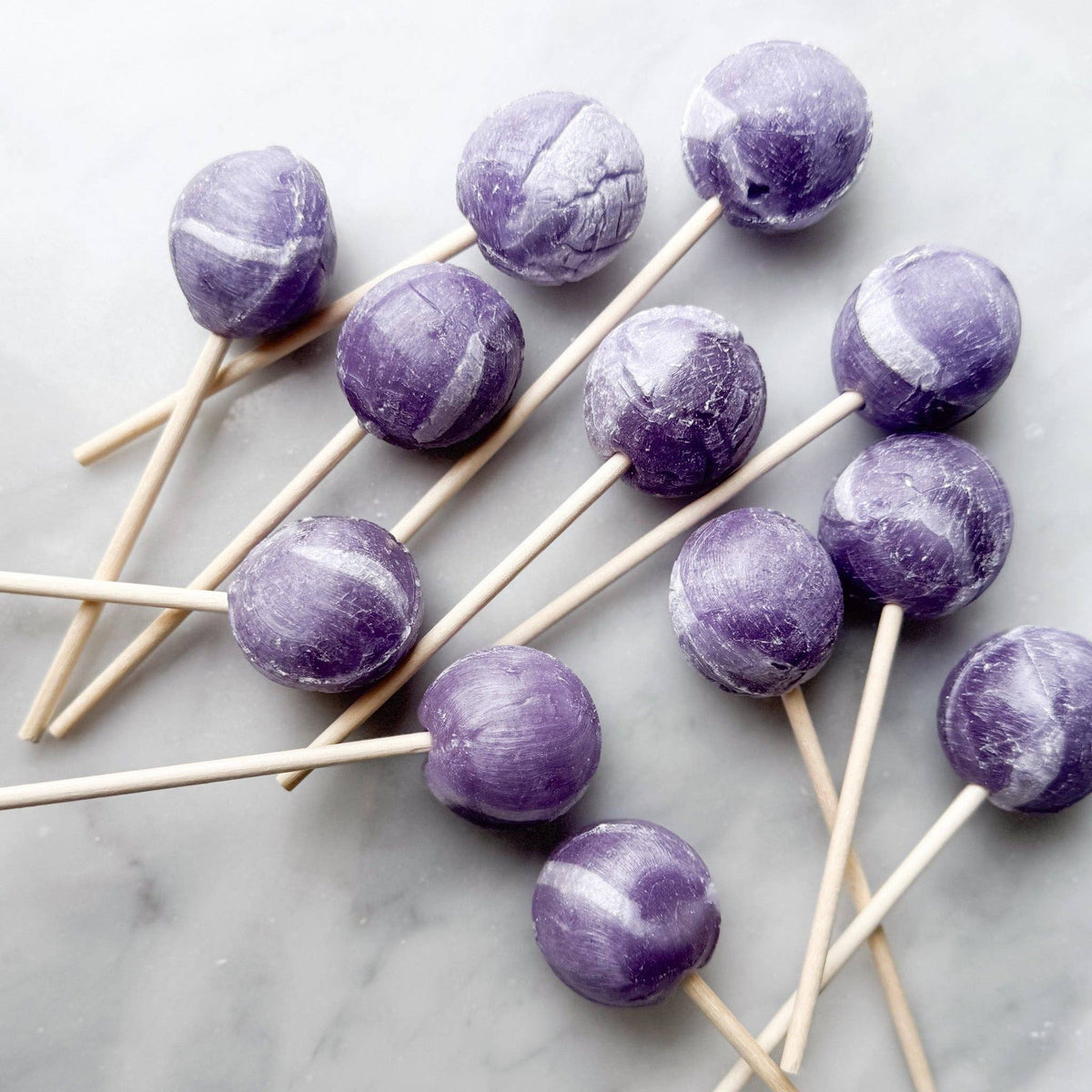Experience a delightful balance of flavor with our Blackberry Lime Fizz Lollipop, created to capture the essence of a refreshing mocktail. This lollipop combines the sweet taste of ripe blackberries with a zesty lime kick, enhanced by a hint of fizziness. This refreshing combination offers a playful and invigorating flavor that appeals to a wide range of palates.
Details:
Made in the USA, our candy is all American candy— made in small batches by our talented candy makers
Ingredients: sugar, glucose, water