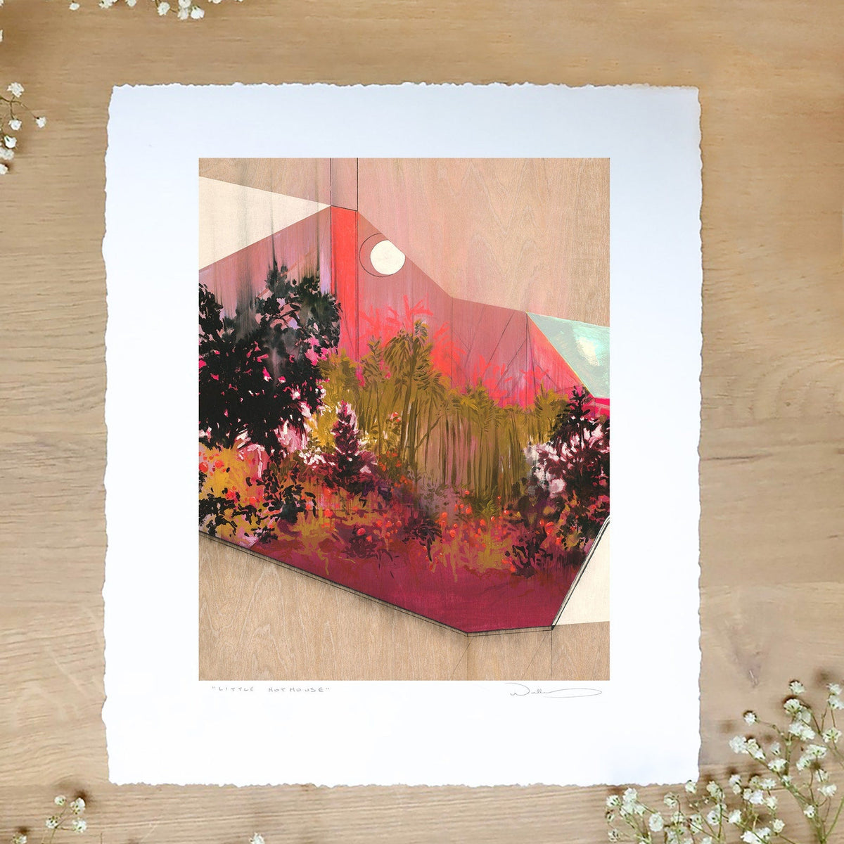 print shown against wood with babies breath.