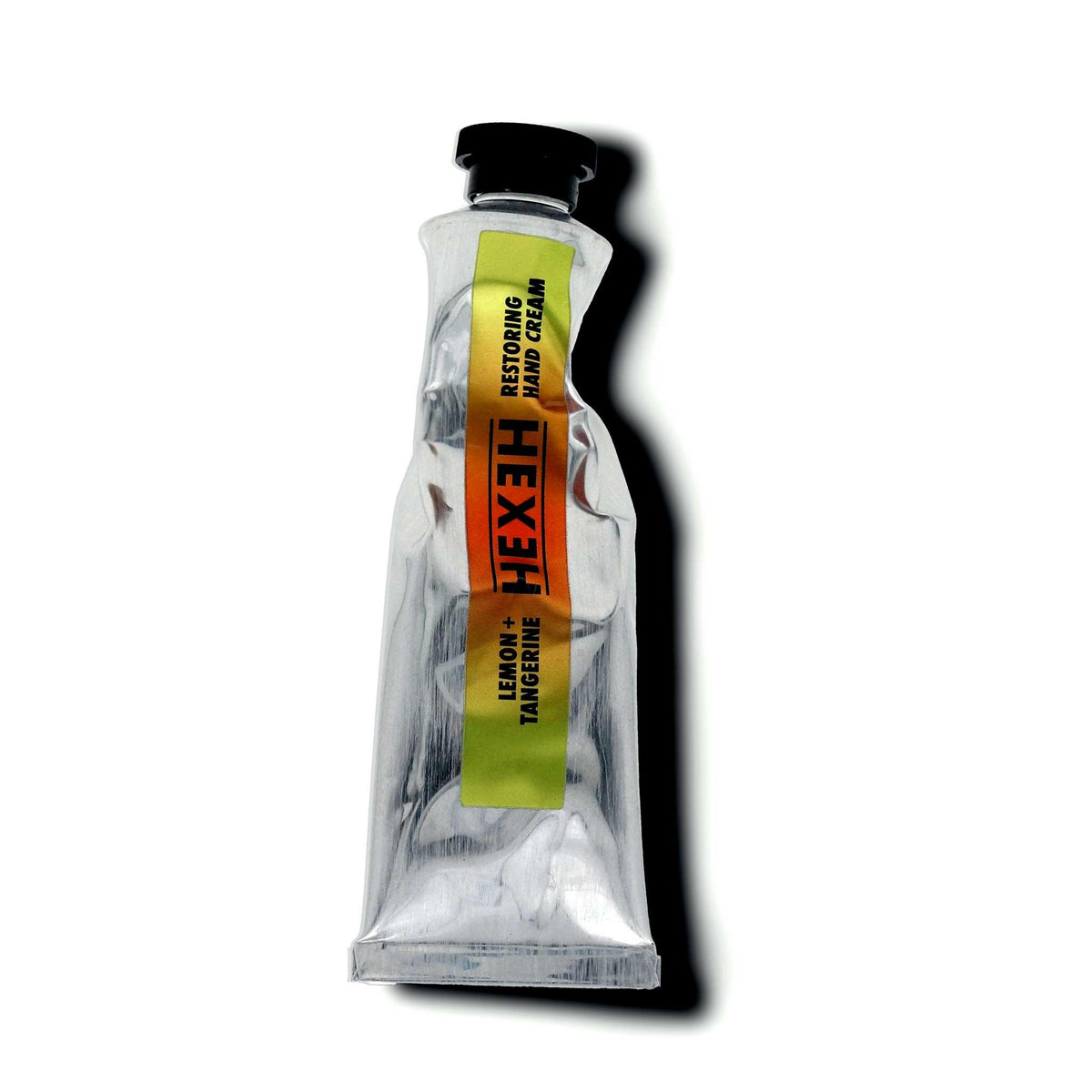 Hand cream tube with HEX branding on a white background Lemon & Tangerine