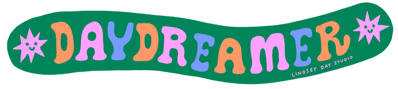 Long wiggly green sticker that says "daydreamer".