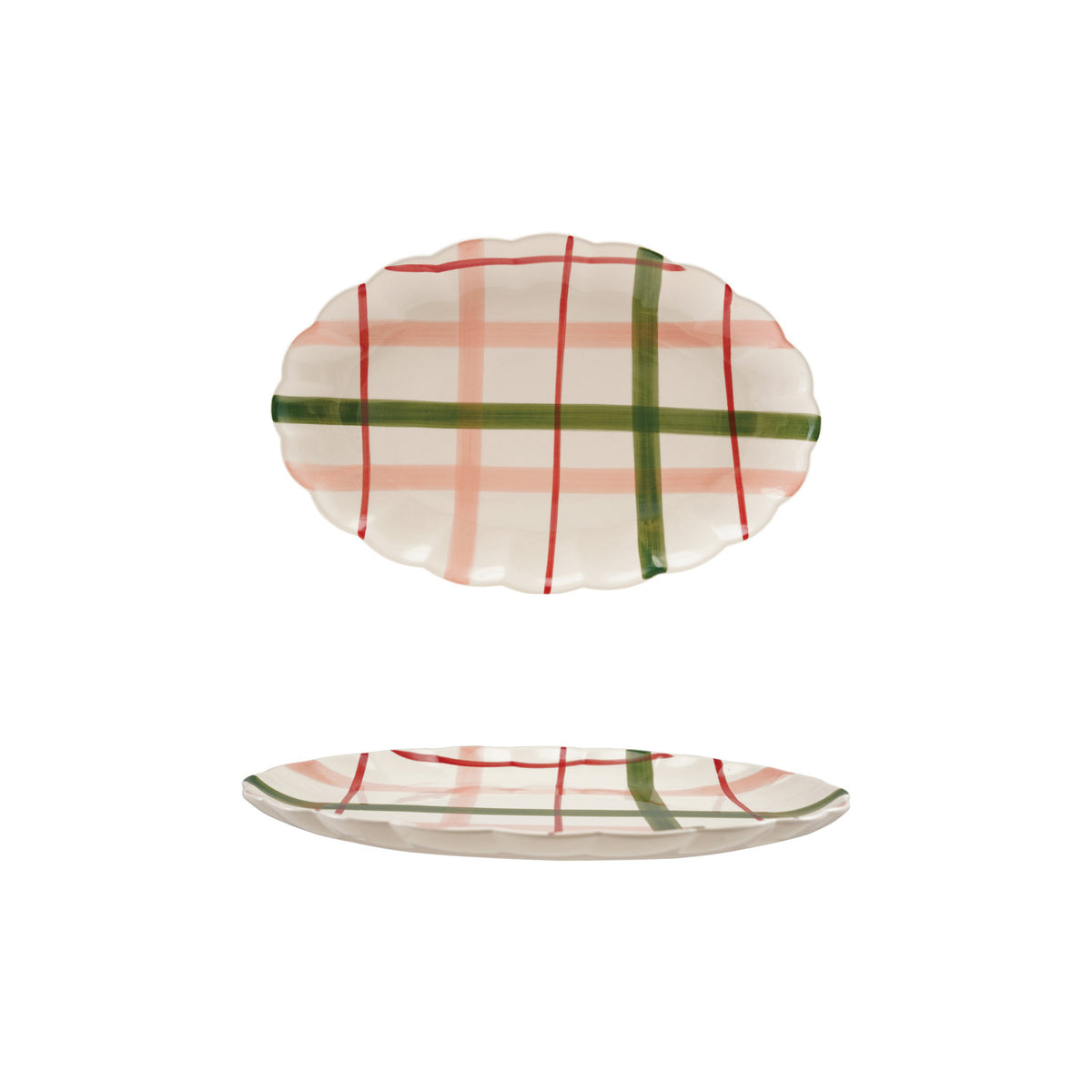 Whimsical Holiday Plaid Stoneware Platter. Bring festive joy and heartwarming charm to your holiday table with our Whimsical Holiday Plaid Stoneware Platter. Hand-painted with a classic plaid pattern and finished with a lovely scalloped edge, this beautiful serving piece is perfect for sharing sweet treats, festive appetizers, and cherished moments with family and friends.