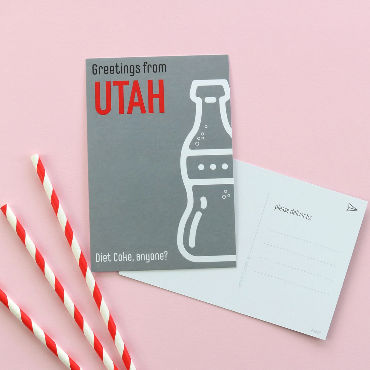 We know you'll think of lots of ways to use these Utah post cards. Size: 4" x 6" Address lines and message space on back Set of 10 postcards Designed & Printed in the USA. picture of a Diet Coke bottle on a post card saying "GREETINGS FROM UTAH- DIET COKE ANYONE?