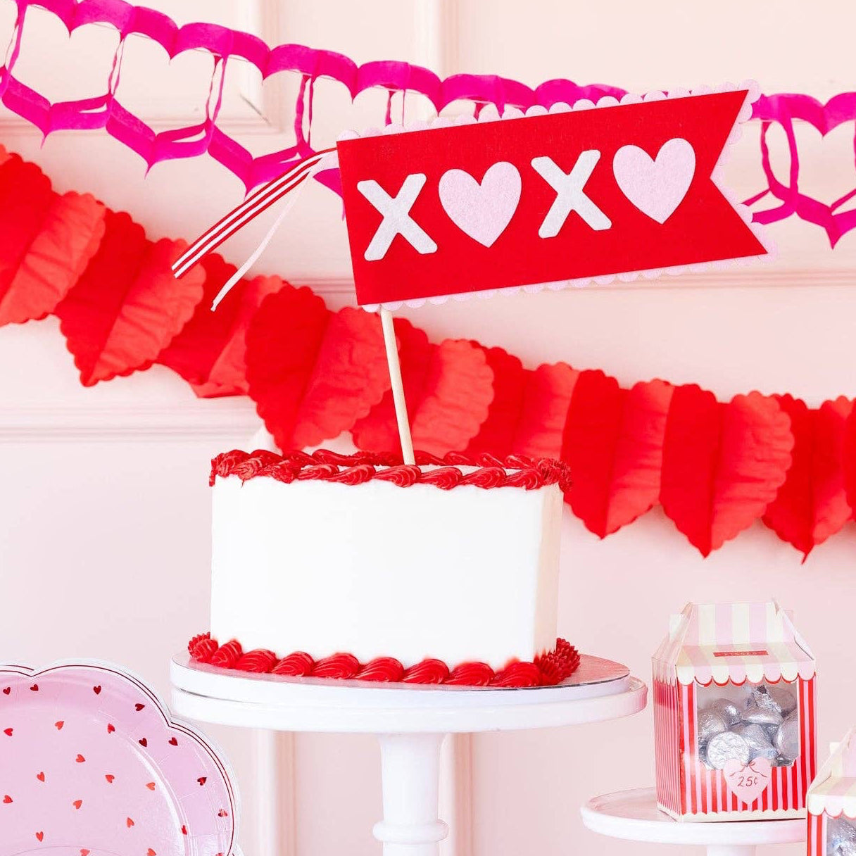 Get ready to celebrate love in style with our XOXO Felt Pennant! This Valentine's Day decoration brings instant festive energy to any space with its playful XOXO design. Transform your venue into a love-filled paradise and set the mood for an unforgettable Valentine's celebration!

Details:

Pink, red, and cream felt pennant
XOXO felt pennant is 4" tall x 9" long
Includes 1 - 14" wood dowel