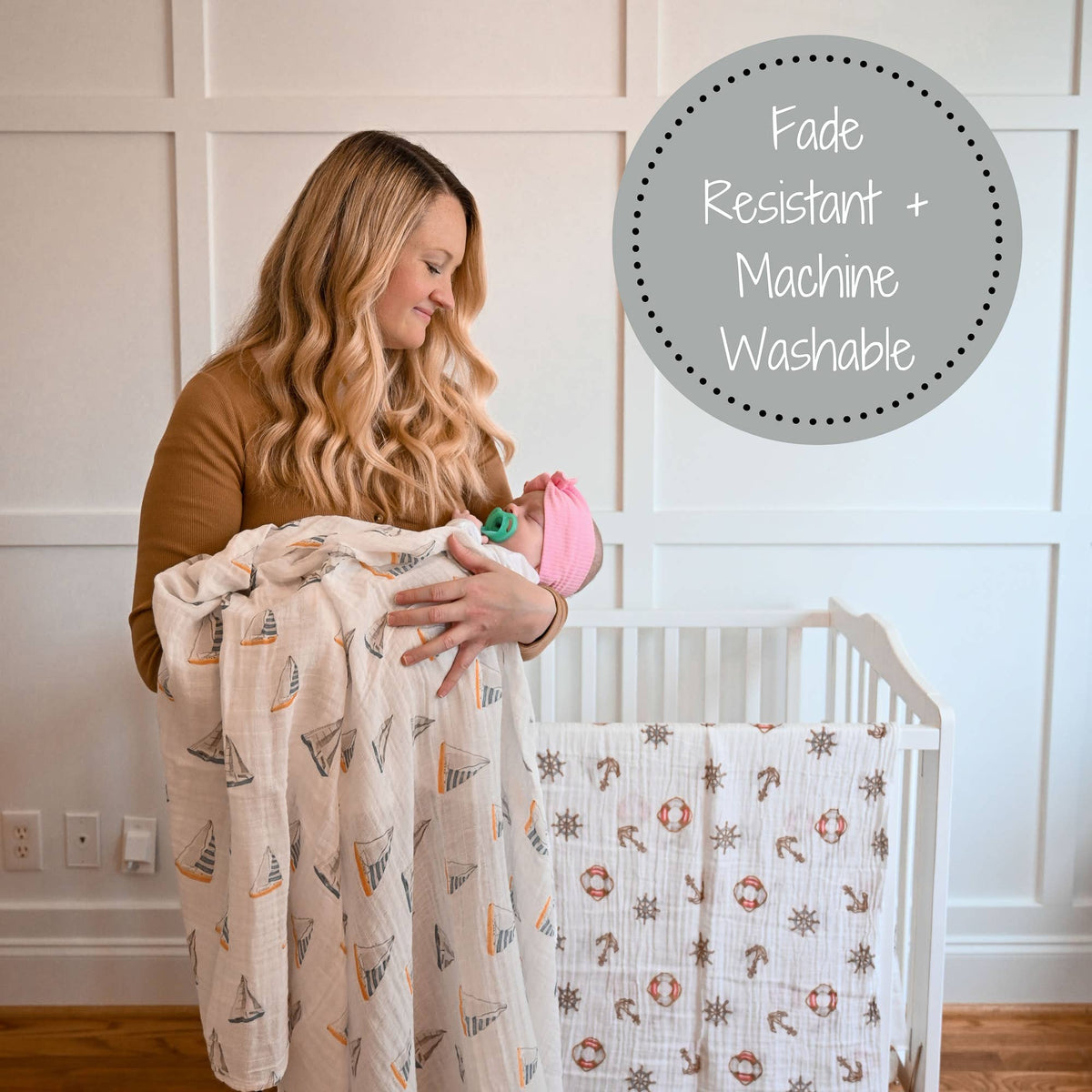 Woman holding a baby wrapped in a blanket with a crib in the background, featuring text about fabric properties.